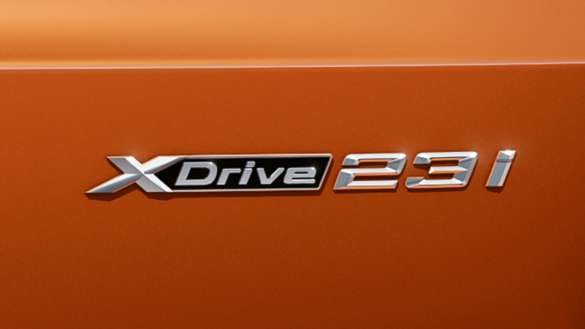 BMW X1 U11 ICE Utah orange metallic xDrive23i xDrive Badge